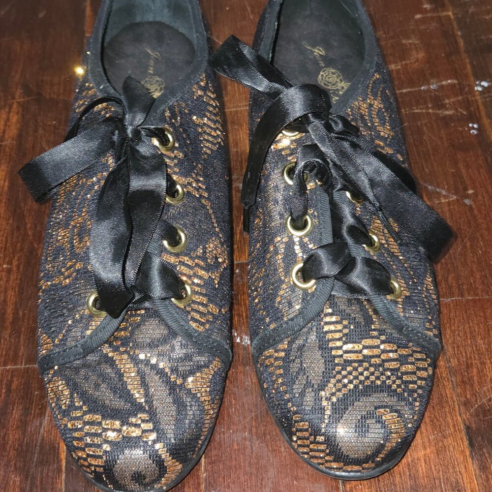 Joan Boyce Black and Gold Sneaker